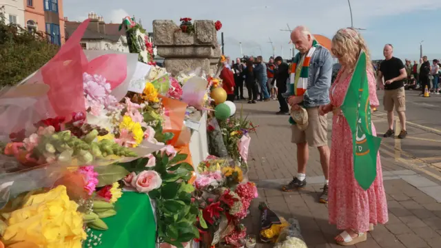 Mourners outside Sinéad O'Connor's house in Bray, County Wicklow