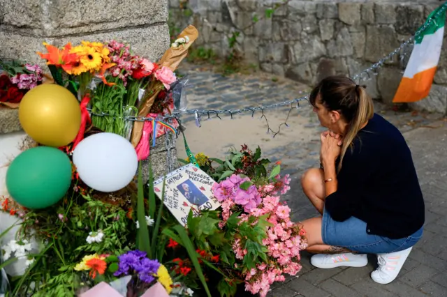 A mourner at Sinéad O'Connor's house in Bray
