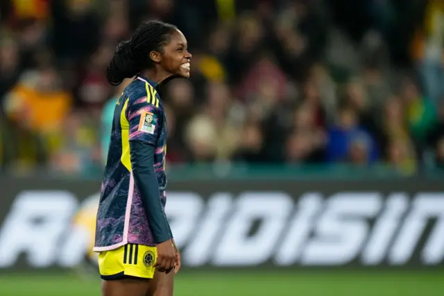 Caicedo grimaces after seeing her shot fly high over the bar.