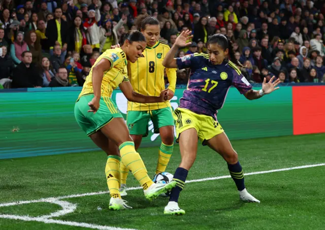 Jamaica defenders are pinned in their own corner by Arias.