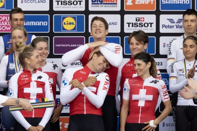 Switzerland celebrate winning gold in the time trial mixed relay at the 2023 Cycling World Championships