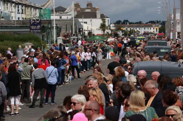 Mourners line the route of Sinéad O'Connor's funeral cortege route