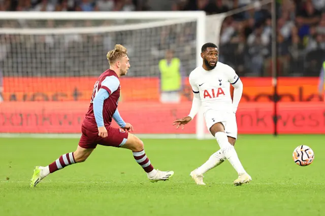 Japhet Tanganga of Tottenham passes the ball away during the pre-season friendly