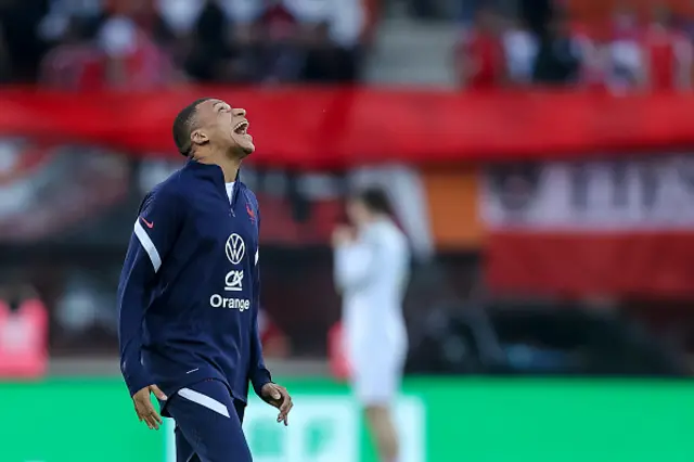 Kylian Mbappe of France laughs prior to the UEFA Nations League