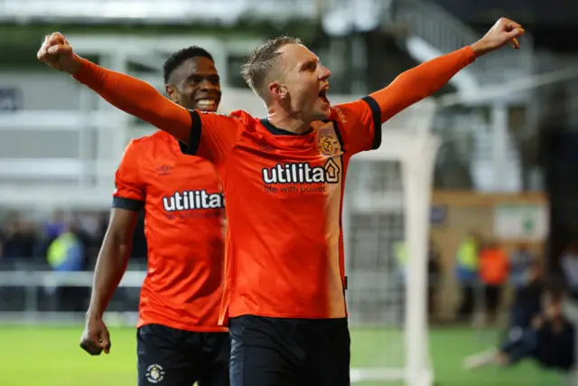 Cauley Woodrow celebrates