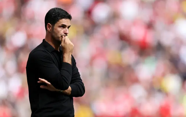 Mikel Arteta in thought on the touchline