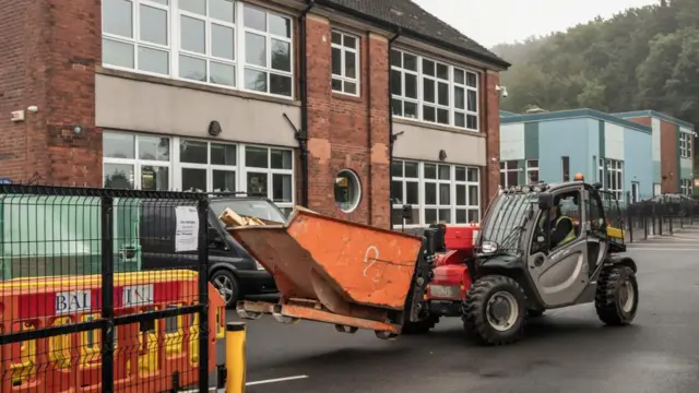 Workmen at Abbey Lane Primary School in Sheffield