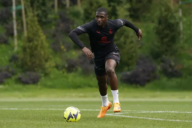 Fode Ballo Toure of AC Milanin action during an training session