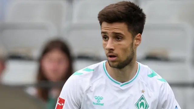 Ilia Gruev looks for a pass during a Werder pre-season game