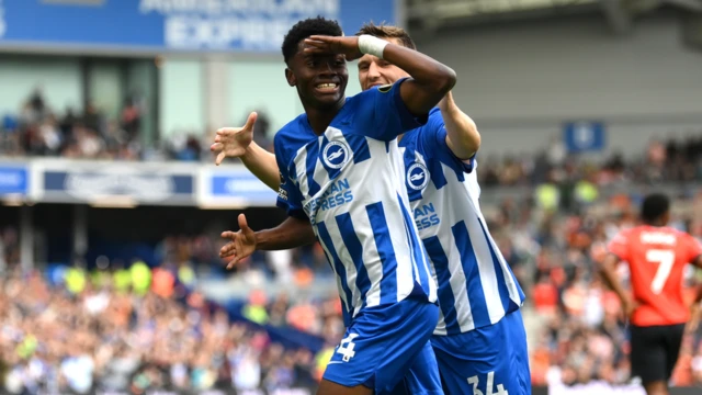 Simon Adingra and Joel Veltman celebrate a Brighton goal against Luton in August.