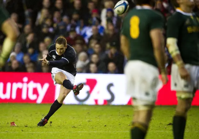 Dan Parks kicks a penalty goal