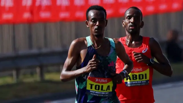 Tamirat Told and Bashir Abdi