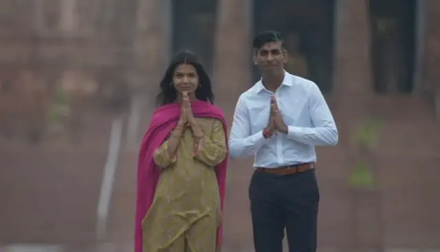 Sunak seen walking to the temple with wife Akshata Murty