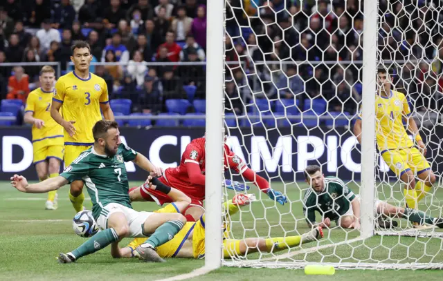 Northern Ireland's Conor McMenamin has a chance cleared off the line.