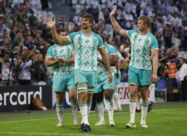 Eben Etzebeth and Pieter-Steph du Toit wave to the South African fans