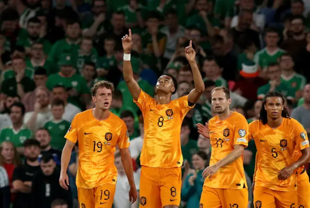 Coady Gakpo celebrates scoring