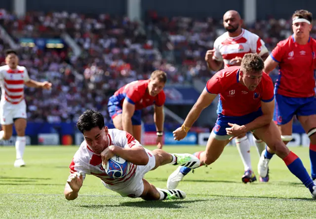 Ryoto Nakamura of Japan scores his team's fifth try