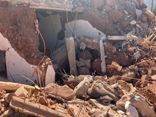 A house entry destroyed by the quake