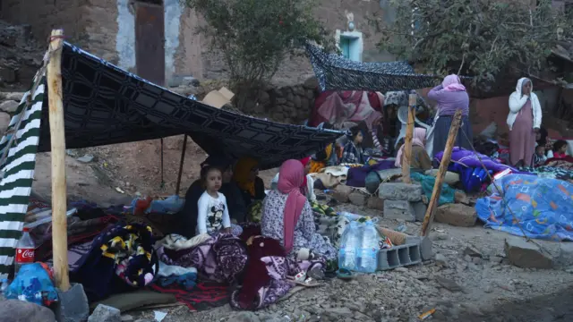 People camping by the roadside in Imgdal, Morocco