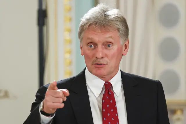 Kremlin spokesman Dmitry Peskov speaks before a press conference of Russian President Vladimir Putin