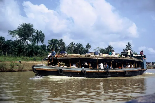 Typical ferryboat on the Nun River in Bayelsa State in the Niger Delta of Nigeria, West Africa.