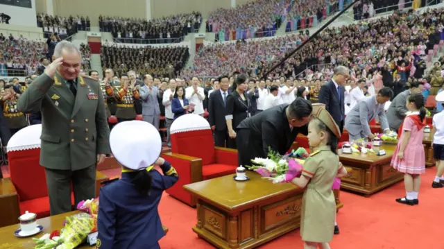 Sergei Shoigu greets children in Pyongyang