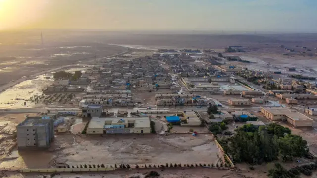 Aerial view of Al-Mukhaili buildings with flood water