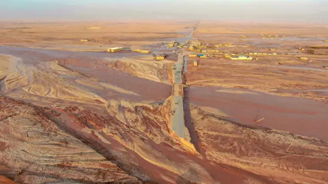 General view of flood water covering the area as a powerful storm and heavy rainfall hit Al-Mukhaili, Libya