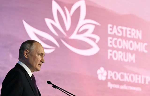 Putin giving an address at the Eastern Economic Forum on 12/9