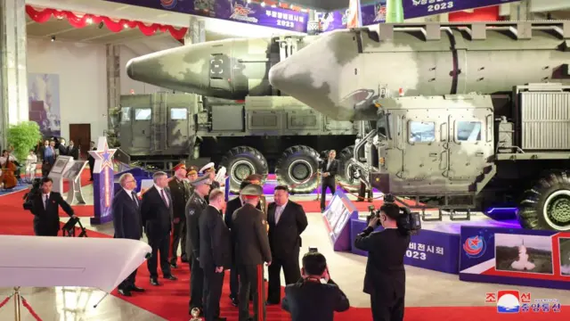 Sergei Shoigu is shown North Korean missiles by Kim Jong Un