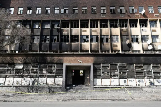 A general view of a burned apartment block in Johannesburg on September 1, 2023. More than 70 people have died in a fire that engulfed a five-storey building in central Johannesburg on August 31, 2023, the South African city's emergency services said.