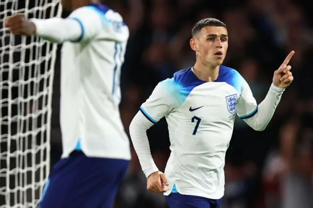 Phil Foden celebrates firing England in front