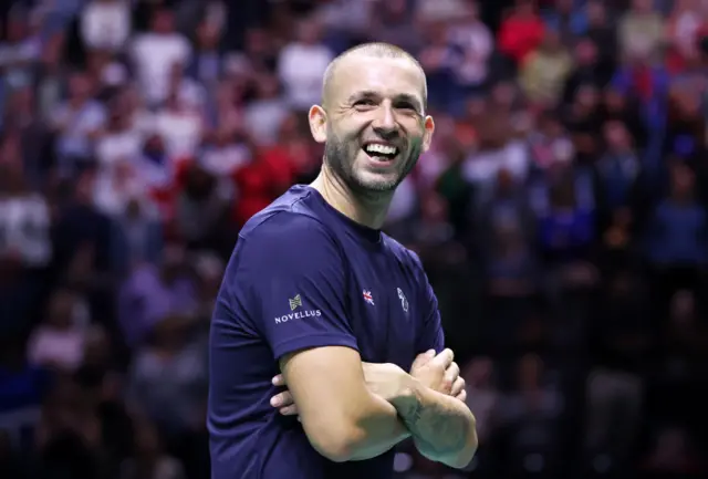 Dan Evans celebrates at Davis Cup