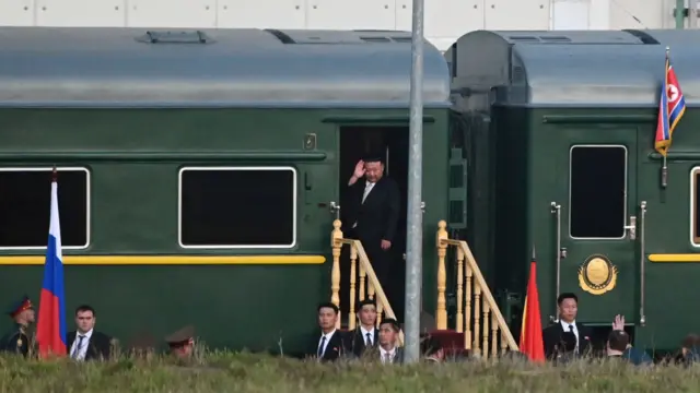 North Korea's leader Kim Jong Un boards his train as he leaves the Vostochny Сosmodrome after a meeting with Russia's President Vladimir Putin