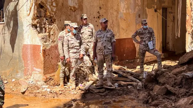 Members of the Egyptian army inspect the damages, following a powerful storm and heavy rainfall hitting the country, in Derna September 13, 2023.