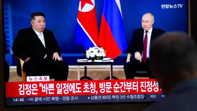 Kim and Putin holding talks at the Vostochny Cosmodrome