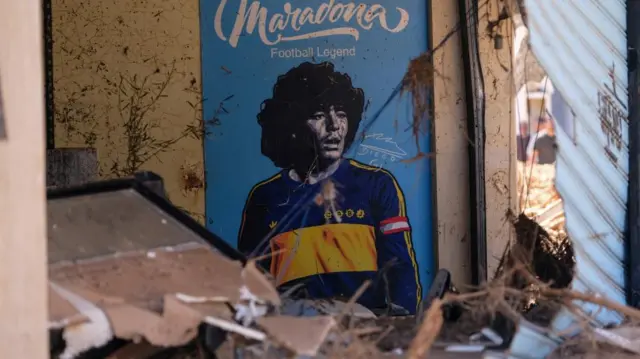 A poster of late Argentine soccer legend Diego Maradona amidst the rubble in Derna, Libya - 13 September 2023