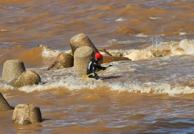 A member of Turkey'sState Disaster and Emergency Management Authority (AFAD) in the sea amid rescue operations in eastern Libya - 13 September 2023