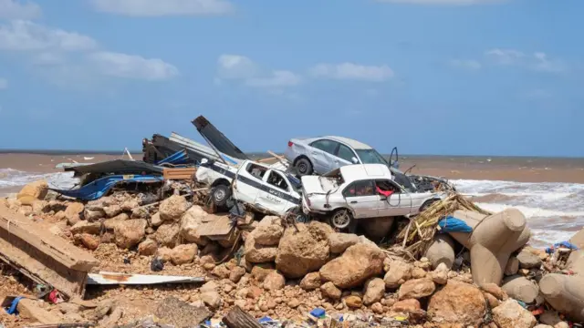 A view shows damaged cars, after a powerful storm and heavy rainfall hit Libya