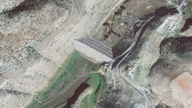 A satellite image shows upper dam in Wadi before the floods in Derna