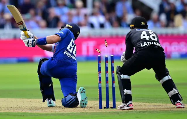 Joe Root is bowled by Rachin Ravindra