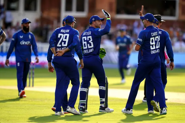 Jos Buttler celebrates a wicket