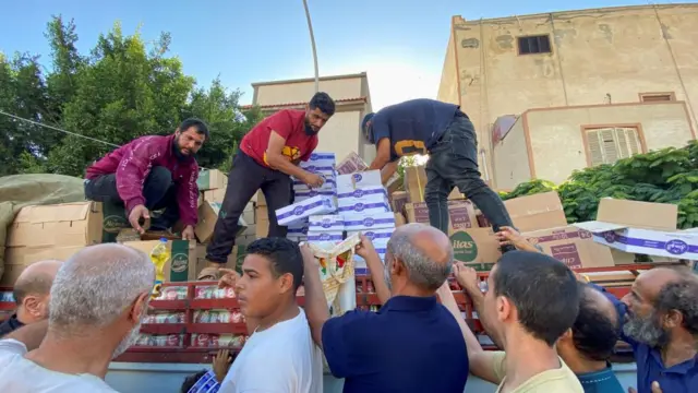 Food aid being distributed in Derna