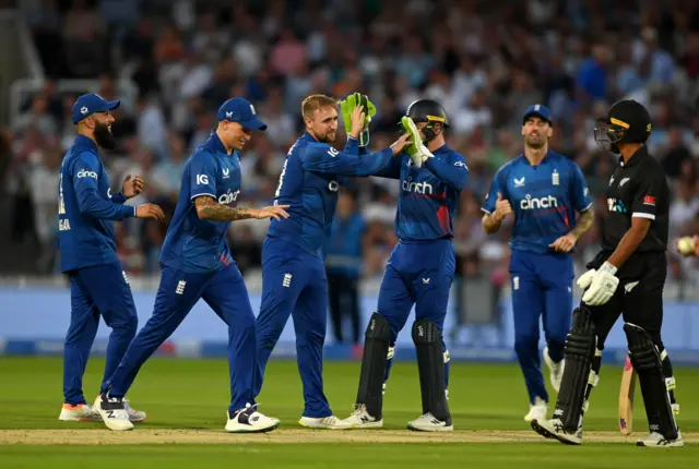 Liam Livingstone celebrates the wicket of Glenn Phillips