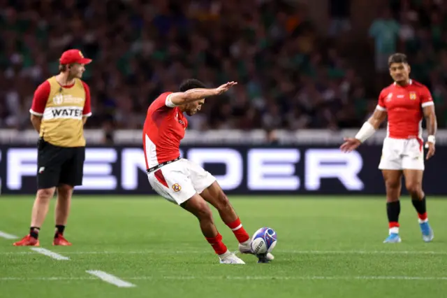 Tonga's William Havili kicks a penalty