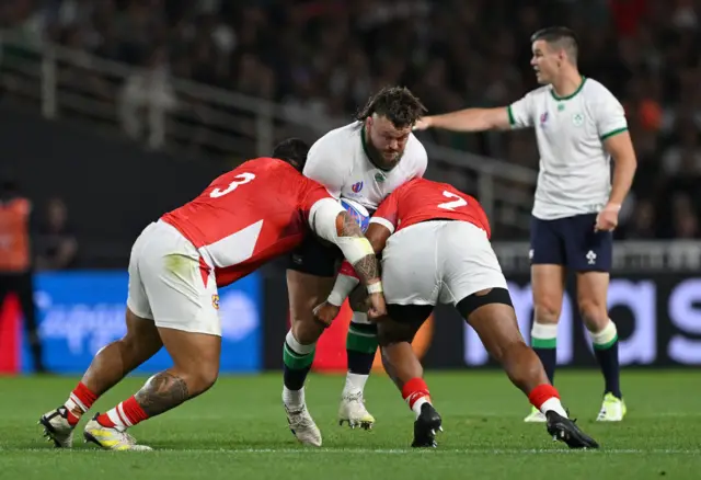 Andrew Porter of Ireland is tackled