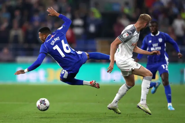 Cardiff City's Karlan Grant falls to the ground