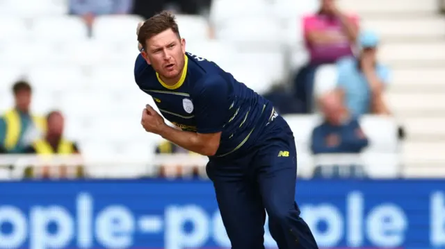 Liam Dawson bowling for Hampshire