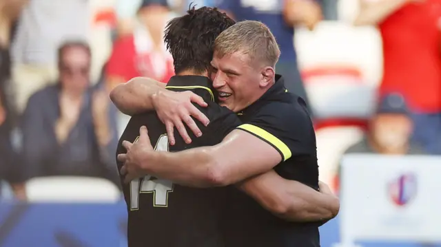 Jac Morgan hugs Louis Rees-Zammit