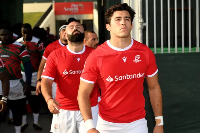 Tomas Appleton leads his side out